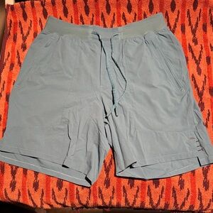 Men's Lululemon license to training Teal Shorts 7” unlined(EUC)